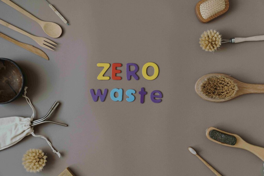 Person organizing a small zero-waste kitchen station with reusable bags and jars
